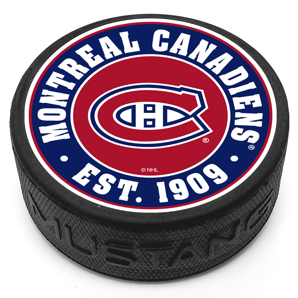 Montreal Canadiens Team Established Textured Puck - Hockey Hall of Fame