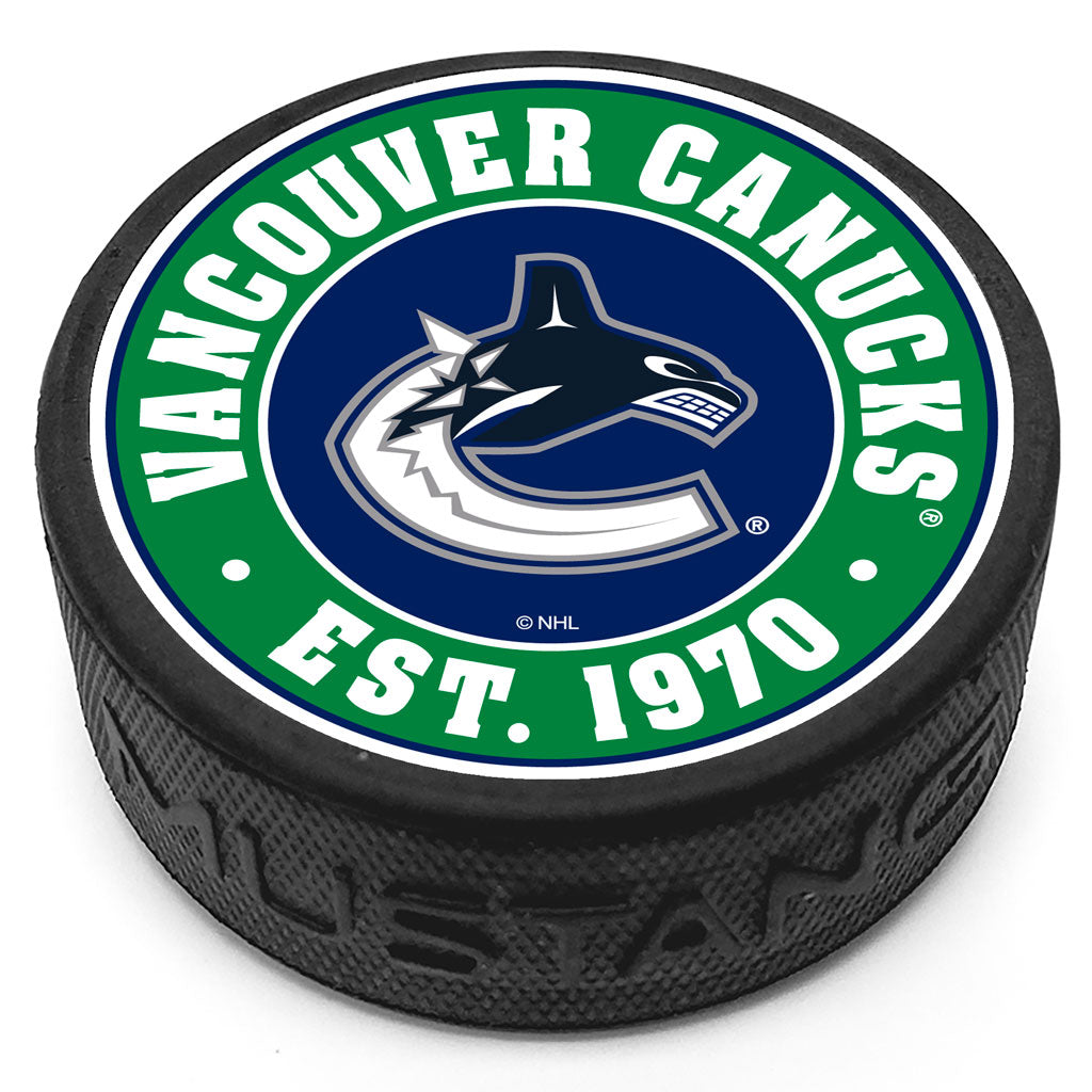 Vancouver Canucks Established Textured Puck - Hockey Hall of Fame